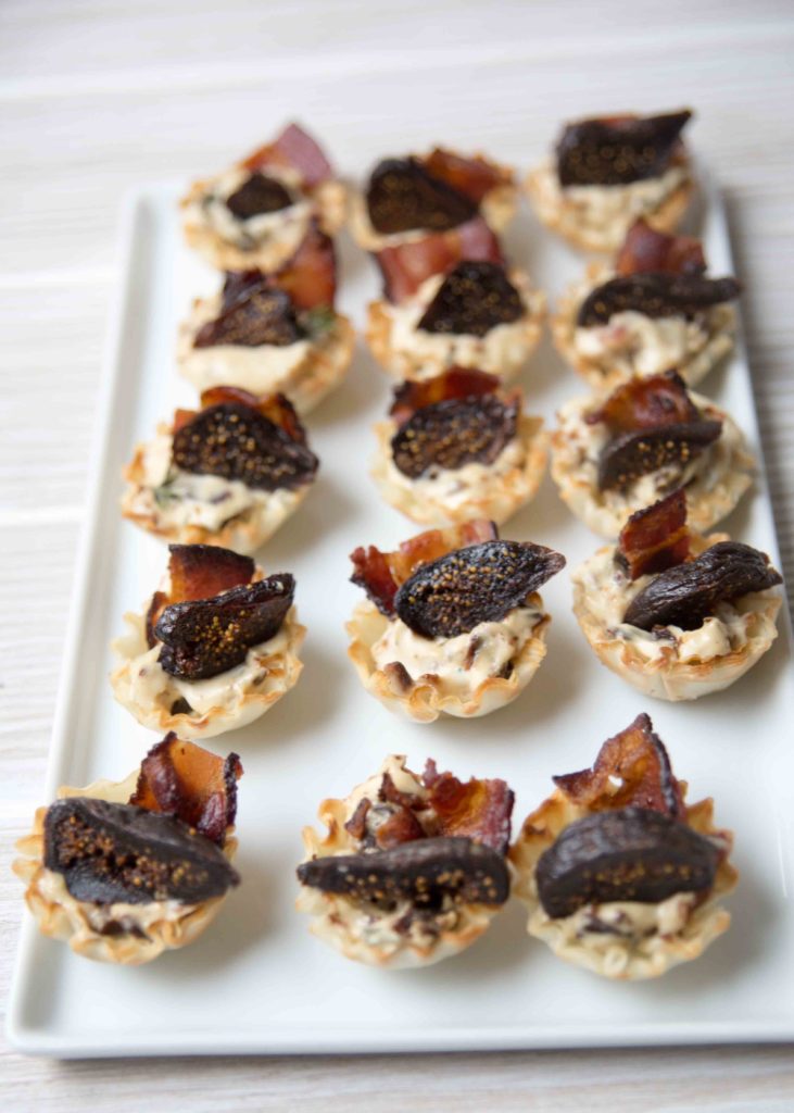 Bacon Wrapped Figs with Cream Cheese Tartlets are our favorite appetizer for New Year's Eve!