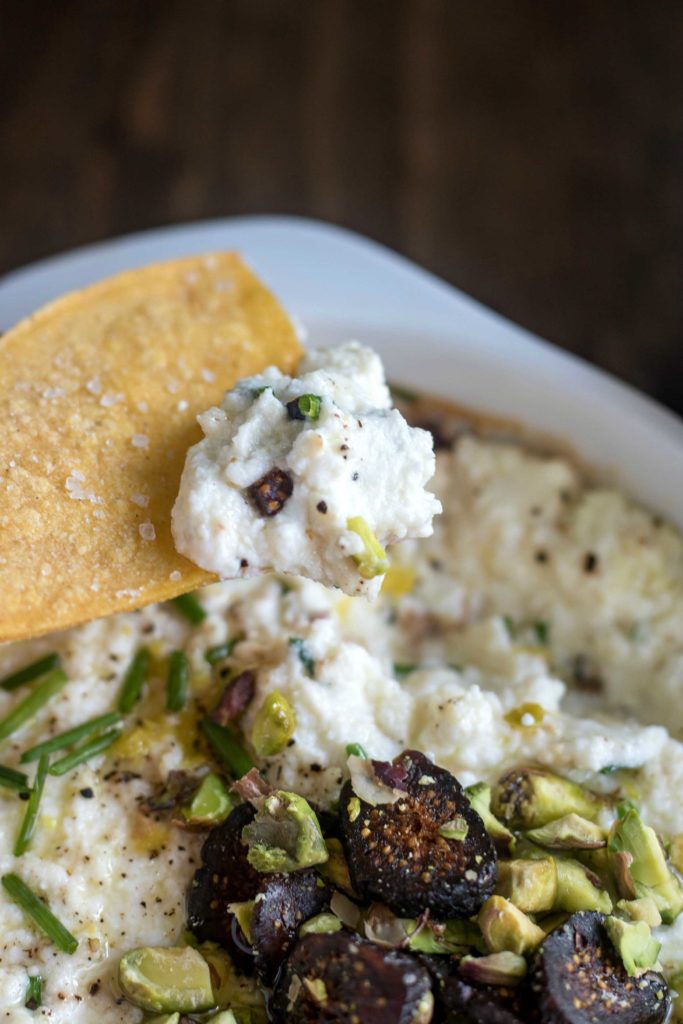 Dip into honey dried fig baked ricotta with tortilla chips, crostini, or crackers. 