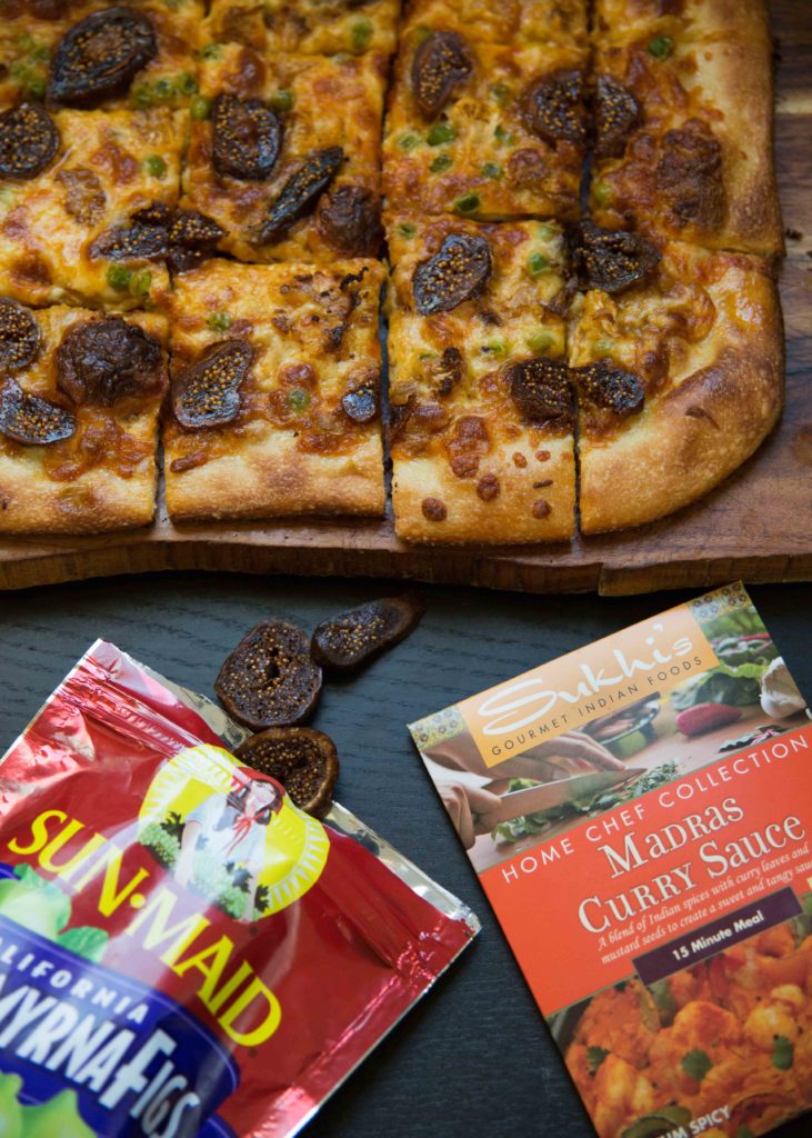 Sukhi's Madras curry sauce adds the right amount of spice to curry pizza with figs and cauliflower for a vegetarian meal everyone will love.