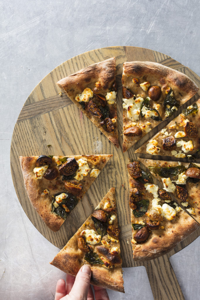 Baking with a pizza stone in the oven is key for a crisp crust for homemade dough. Try our salty feta cheese on pizza with sweet figs and a drizzle of honey.