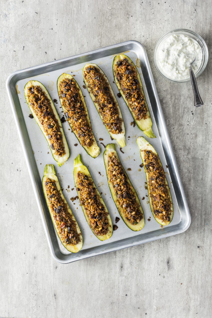 A zuchini boat recipe is one of the best ways to use a glut of zucchini. Here, we've cut the zucchini boats in half and stuffed both sides with a sweet and savory spiced lamb and fig filling.