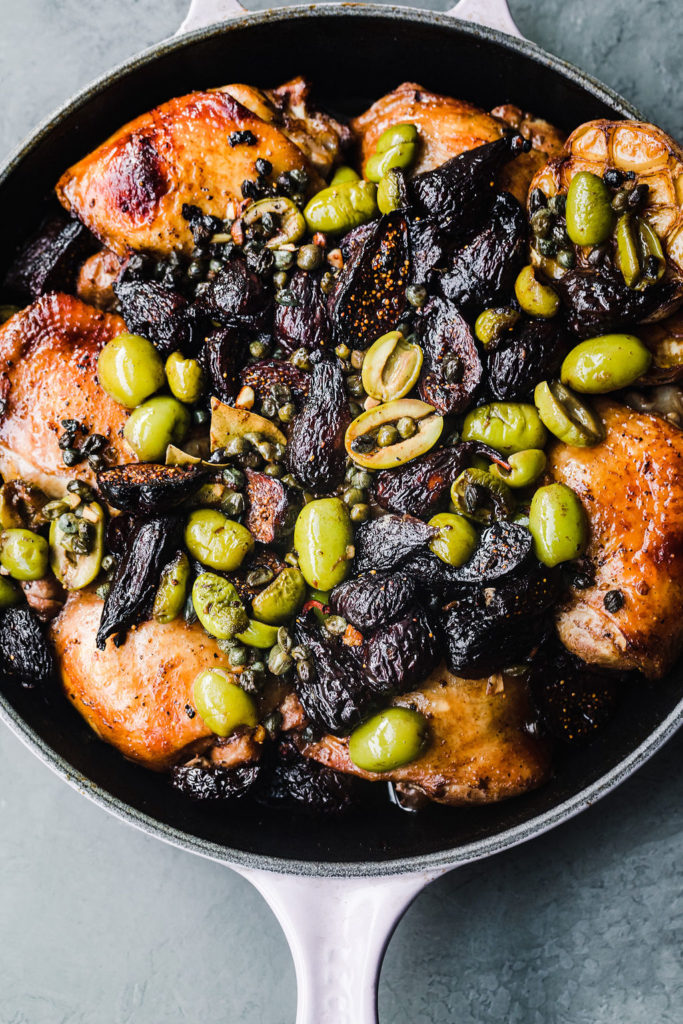Chicken marbella with olives and figs is deceptively easy to make. Marinate the fig chicken thighs and then bake for feel-good comfort food.