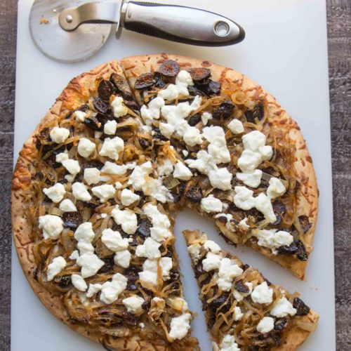 Caramelized onions make fig goat cheese pizza tasty. Use dried mission or golden figs with the caramelized onion—both add sweetness to a hint of balsamic.