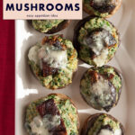 Bacon blue cheese stuffed mushrooms on a white plate on a red background