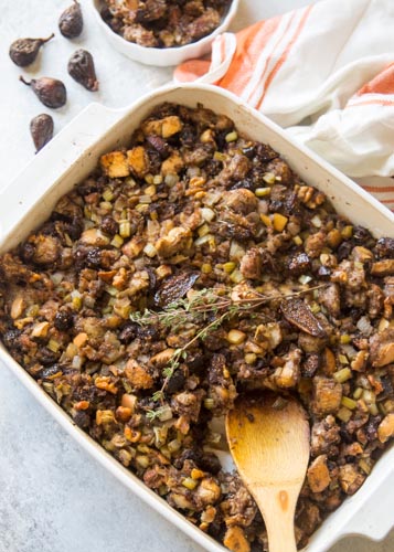 Make this Thanksgiving dressing recipe for the big day. With a splash of wine, crumbled sausage, dried figs, and walnuts this is a keeper.