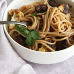 Bowl of whole wheat spaghetti with cauliflower and figs