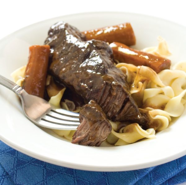 Our Guinness braised beef short ribs recipe is tasty to eat beyond St. Patrick's Day. Braised beef short ribs and figs make this a cozy dish.