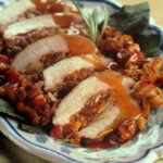 Apple stuffing for pork marries sweet and salty in a showstopper main dish. Pork loin recipes are a great main dish for celebrations.