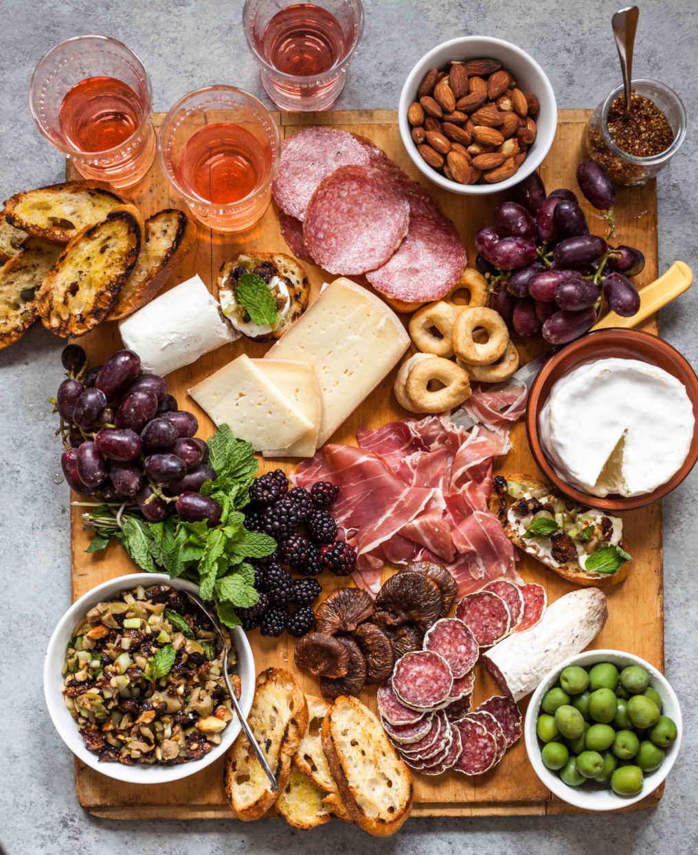 Pass on the cheese plate & plan on an antipasto platter. Adding dried fig relish to a charcuterie board with nuts & cheese is so much better!