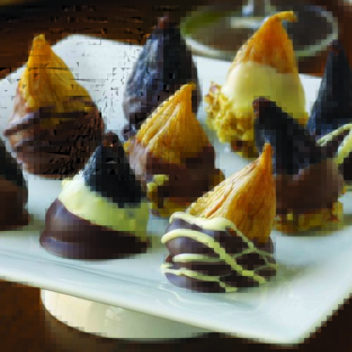 Chocolate dipped figs are an easy dessert. Before dipping them, try stuffed figs for a surprise inside. Find tips for chocolate covered figs.