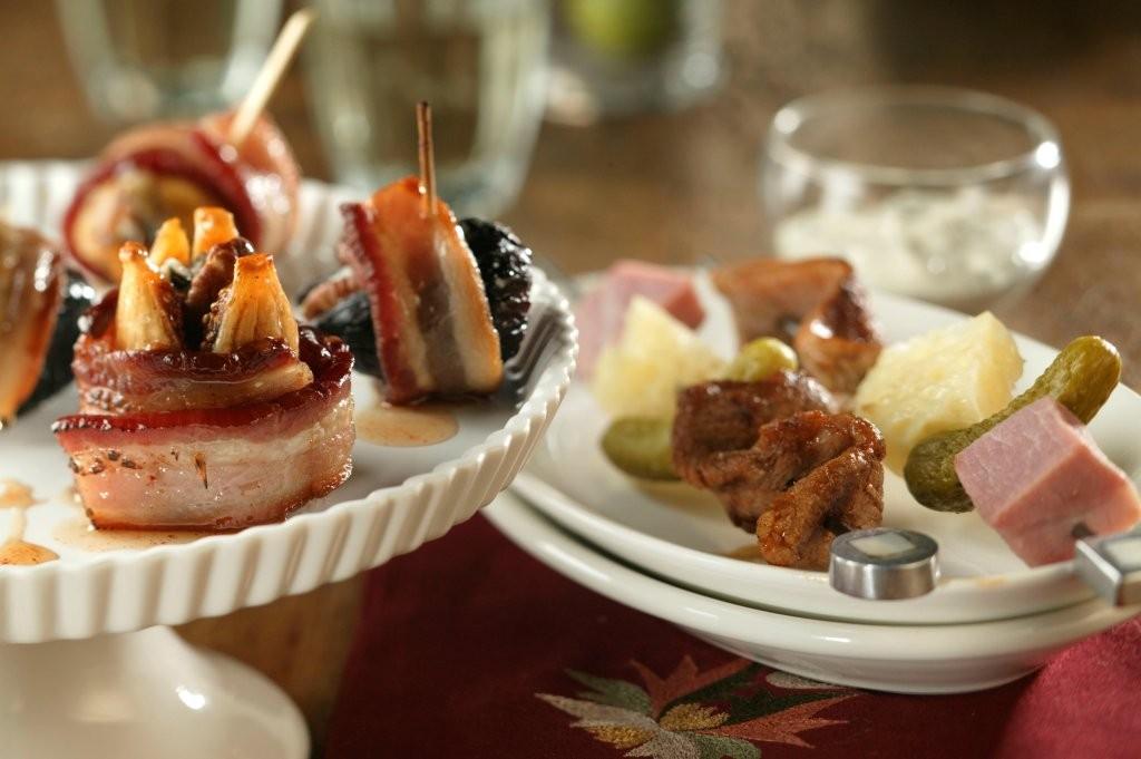 Bacon wrapped figs are a classic appetizer, but glaze them with maple snakebite goat cheese dip—that twist of spice and sweetness takes them over the top.