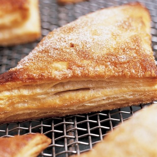 Apple turnovers with figs are flaky on the outside and full of juicy fruit inside. This apple turnover recipe is great for holiday breakfasts.