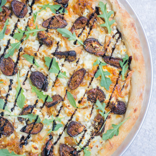 It's pizza night tonight! What makes this goat cheese pizza with figs and chicken unforgettable is the balance of savory ingredients with a balsamic drizzle!