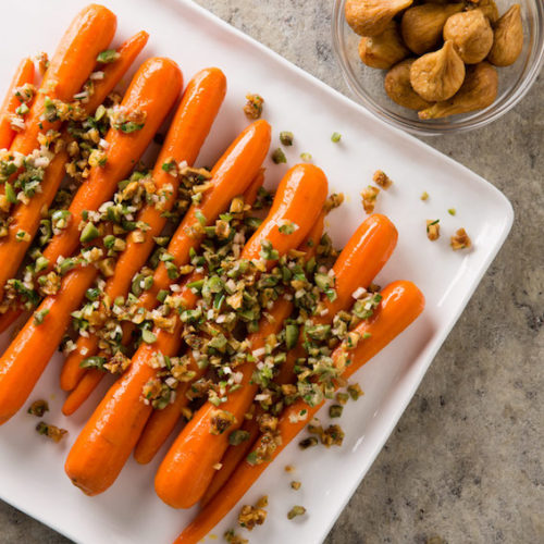 slow cooked whole carrots with olive fig relish