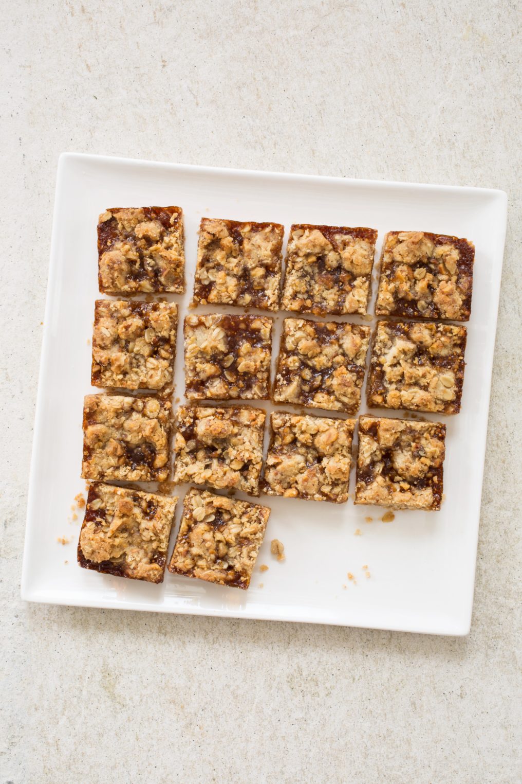 Streusel Fig Bars are the best fig bars! Crumbly streusel tops warm sweetened fig filling baked until jammy. Take them to a potluck or try them for dessert.
