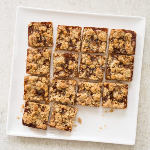 Streusel Fig Bars are the best fig bars! Crumbly streusel tops warm sweetened fig filling baked until jammy. Take them to a potluck or try them for dessert.