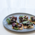 Lavash pizza with mission figs on a platter
