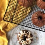 The Easter bunny will go wild for Carrot Fig Mini Bundt Cakes. Drizzled with honey cream cheese glaze, this carrot cake recipe is holiday-ready.