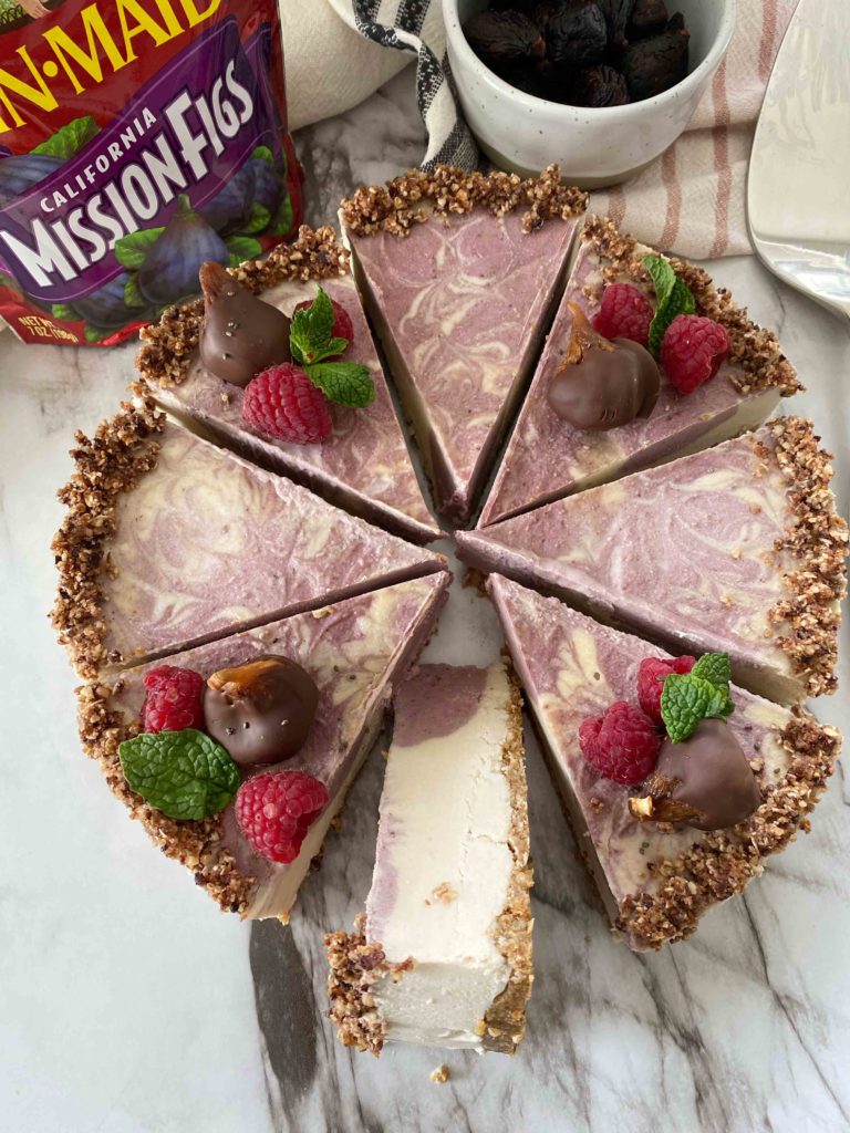 Eating well can include heart healthy dessert recipes. This no-bake vegan cheesecake with fig crust and berries is a sweet treat.