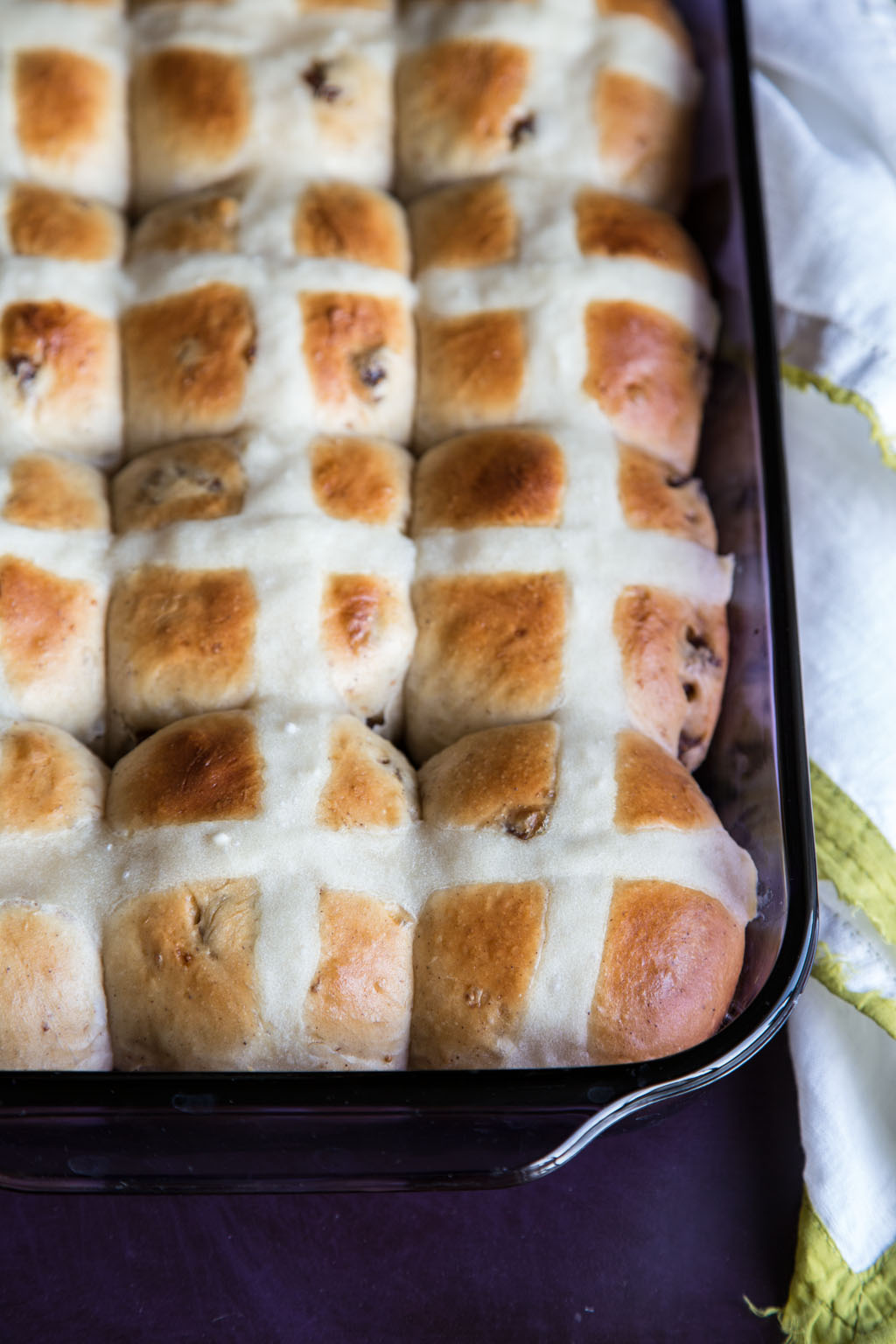 Celebrate Easter by baking this traditional hot cross buns recipe. Dried figs add a chewy sweet bite in the tender old fashioned hot cross buns recipe.
