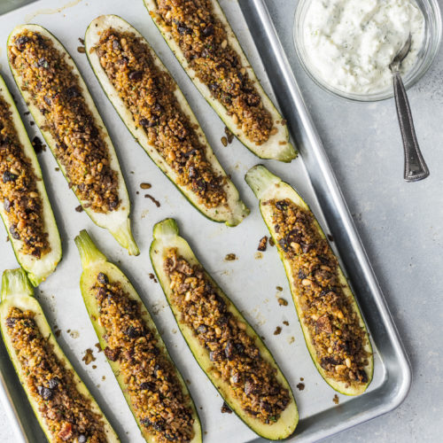 When zucchini season hits and you've got more summer squash than you know what to do with, make this zucchini boat recipe stuffed with spiced lamb and figs.
