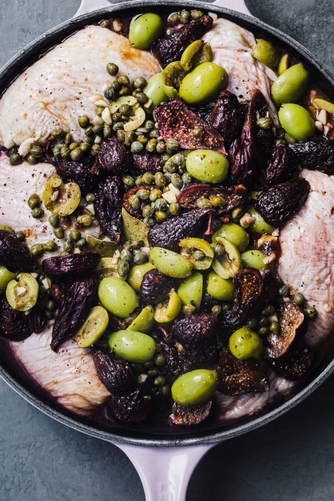 raw chicken with figs, briny capers, and olives