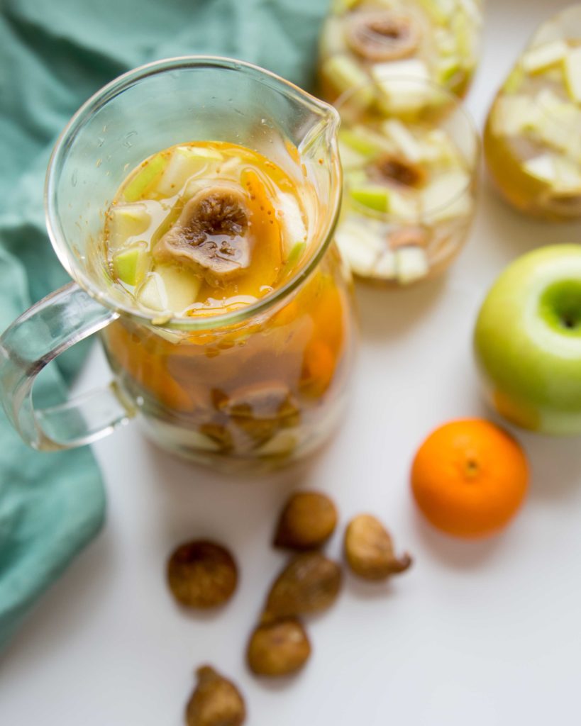 Is boozy fruit in sangria your favorite part? Golden dried figs make white wine sangria with ginger ale a refreshing drink to enjoy all year.