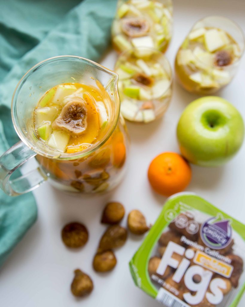 Is boozy fruit in sangria your favorite part? Golden dried figs make white wine sangria with ginger ale a refreshing drink to enjoy all year.