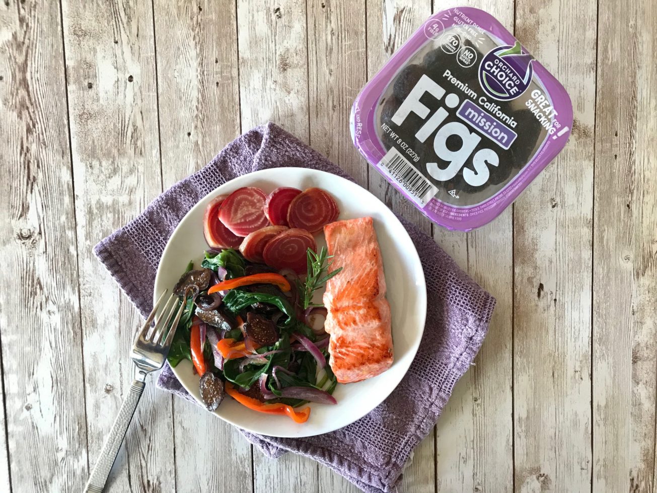 Pan-seared salmon with sauteed beet greens is a delicious way to increase your potassium with dried figs at dinner.