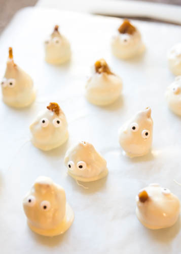 Golden figs in white chocolate go spooky for Halloween candy ghosts that will make you say boo! These chocolate covered figs are a fun craft and festive idea for staying in.