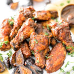 Figs on a plate with fig balsamic chicken wings.