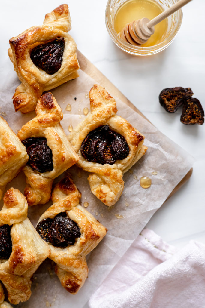 Bring the bakery home with fig and honey cream cheese breakfast pastries. Using puff pastry makes these flaky morning treats a cinch to bake.