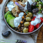 Bowl of roasted vegetables and vegan sauce with Sun-Maid California Dried Mission Figs
