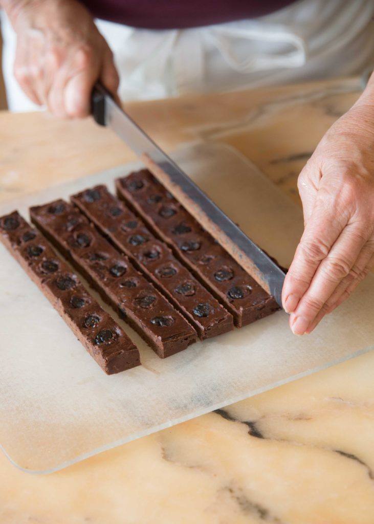 Alice Medrich shows you how to make enrobed chocolates with rich fig filling. Learn her cocoa dusted truffles recipe. 