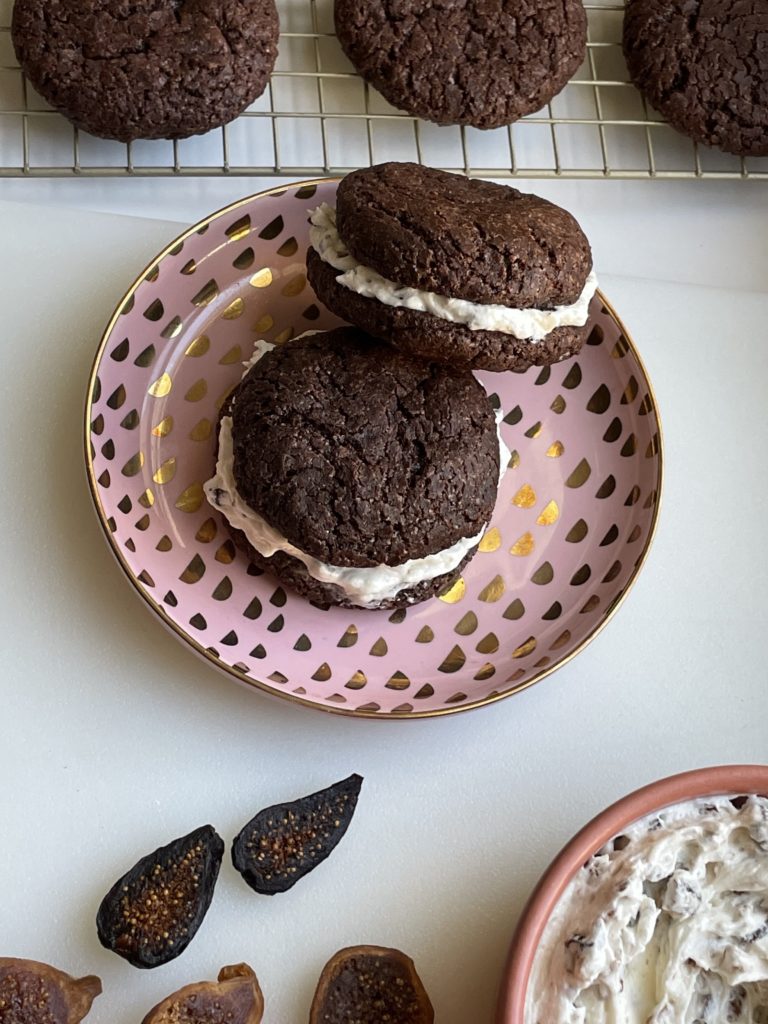 Spread the Figgy Vegan Cream Cheese Frosting on the flat side of one cookie to seal with another cookie to make a brownie sandwich cookie, or spread the frosting on the domed side to top with a sliced fig for a stand-alone cookie.