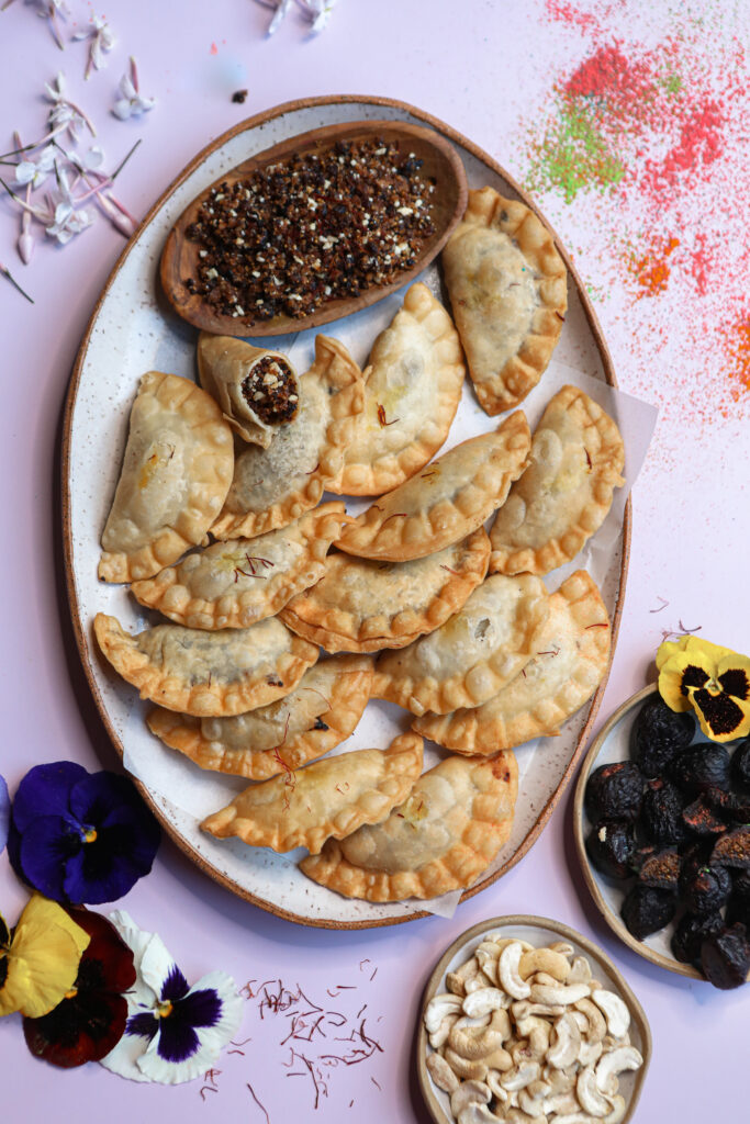 This Holi, celebrate with fig gujiya, flaky on the outside with a fig filling inside. See pictures of gujiya and find a recipe of making gujiya.