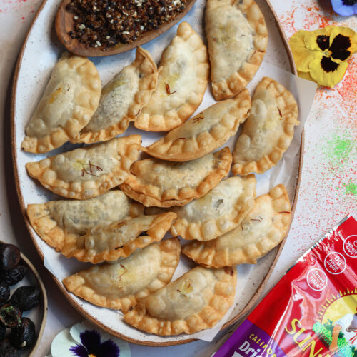 This Holi, celebrate with fig gujiya, flaky on the outside with a fig filling inside. See pictures of gujiya and find a recipe of making gujiya.