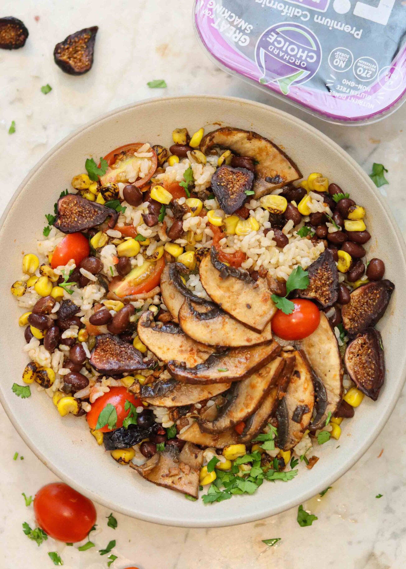 Are figs vegan? Yes! Learn about how figs fit in a vegan lifestyle from RD Anna Rios and make her recipe for mushroom veggie taco bowls with fig salsa.