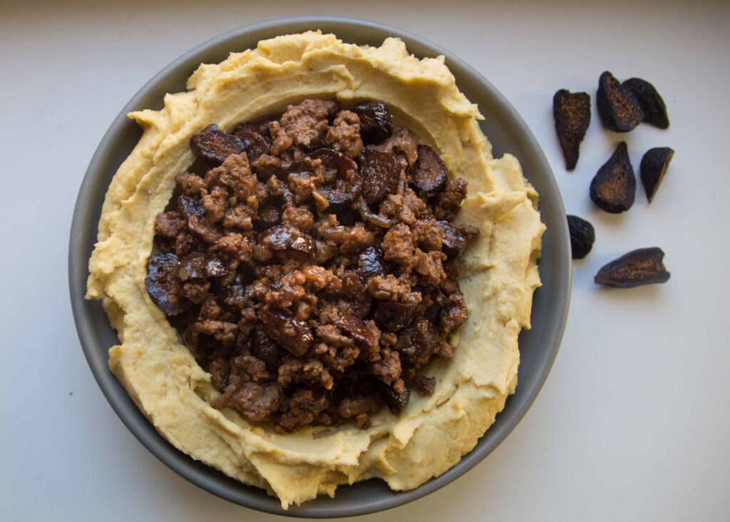 Hummus with lamb + figs in spices brings the chickpea spread into mealtime. Also, find ideas for the best things to dip in hummus. 