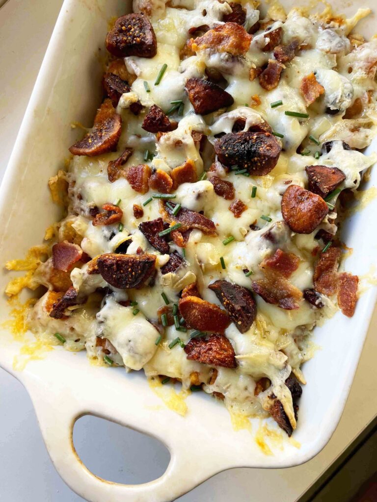 Cheesy with flecks of fig and bacon, this tater tot casserole is about everything you could want in a side dish with crunchy potatoes at the center.