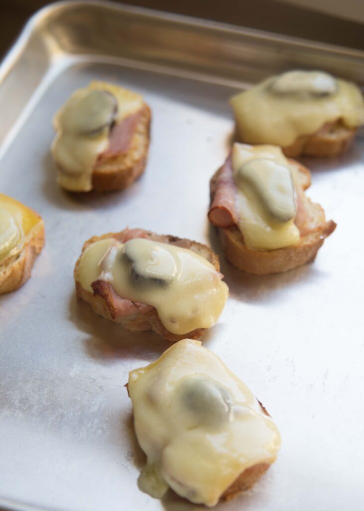 Fig Ham and Cheese Crostini are reminiscent of mini croque monsieur sandwiches. Serve them at your next brunch.