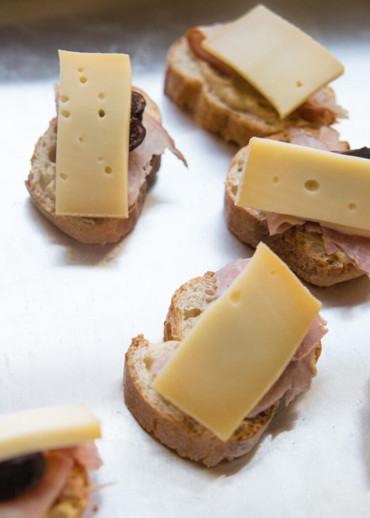 Fig Ham and Cheese Crostini are reminiscent of mini croque monsieur sandwiches. Serve them at your next brunch.