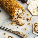A goat cheese log appetizer is holiday-ready—the goat cheese log recipe with figs + hazelnut-nigella dukkah is an easy make-ahead appetizer.