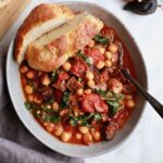 This meatless stew is full of fresh greens and creamy chickpeas. Comfort food can be nourishing— fill up on Cal-Med chickpea stew with figs and tomatoes.