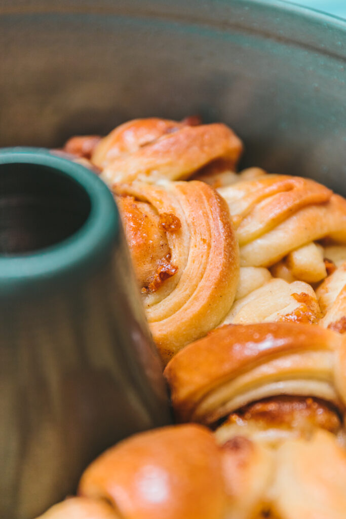 Close-up of croissant dough baked into a Bundt pan as monkey bread.