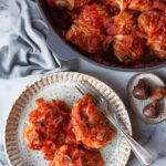So many cultures have their own interpretation of a stuffed cabbage recipe. This easy cabbage roll recipe includes figs inside for sweetness.