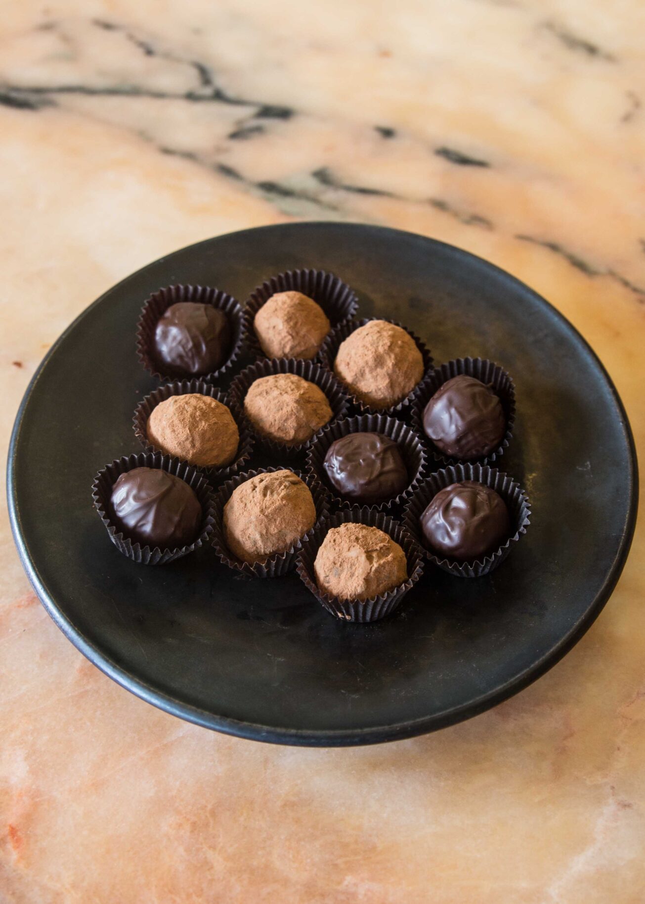 Alice Medrich shows you how to make enrobed chocolates with rich fig filling. Learn her cocoa dusted truffles recipe.