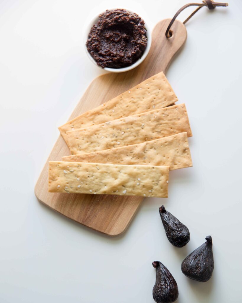 Make fig and olive spread to add pizzazz to sandwiches or charcuterie plates. Fig and black olive spread also tastes great on poultry too.