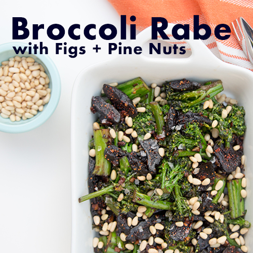 serving dish of broccoli rabe with pine nuts and figs and a bowl of pine nuts