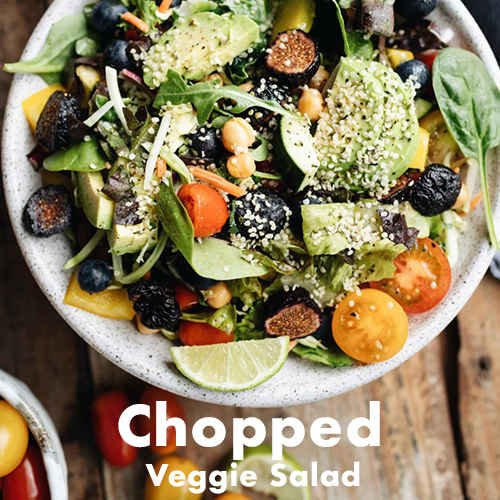 Chopped veggie salad in a bowl is one of our vegan fig recipes